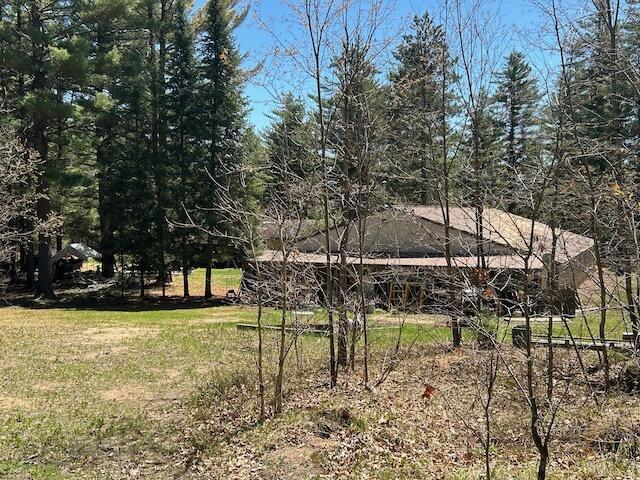 2165 E Cherry Creek Rd, Fairview, MI 48621 - view of grassy yard