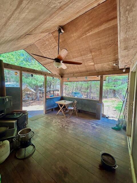 2165 E Cherry Creek Rd, Fairview, MI 48621 - sunroom / solarium featuring wooden ceiling, hardwood / wood-style flooring, a ceiling fan, lofted ceiling, and a wooden deck