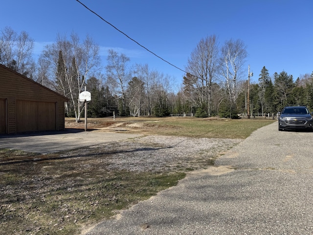 view of yard with a garage