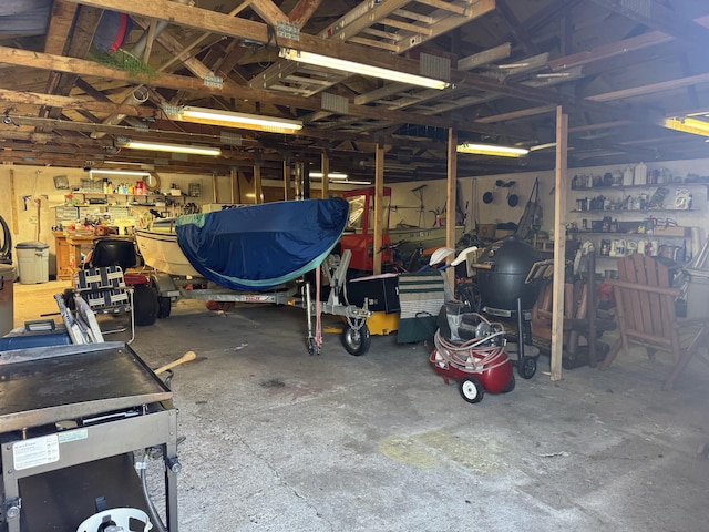 garage with a workshop area
