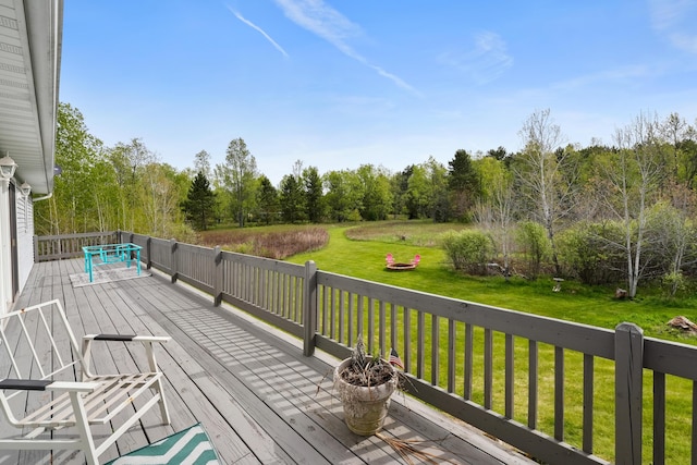 201 Country Ct, Houghton Lake, MI 48629 - wooden deck with a lawn