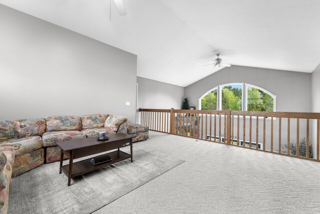 201 Country Ct, Houghton Lake, MI 48629 - carpeted living area with a ceiling fan and lofted ceiling