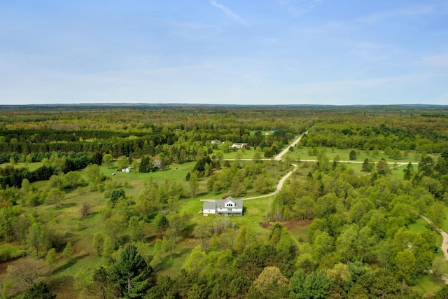 201 Country Ct, Houghton Lake, MI 48629 - aerial view of property and surrounding area featuring a heavily wooded area
