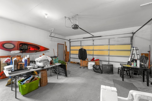 201 Country Ct, Houghton Lake, MI 48629 - garage with a garage door opener