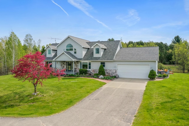 201 Country Ct, Houghton Lake, MI 48629 - view of front of house featuring stone siding, an attached garage, concrete driveway, and a front yard