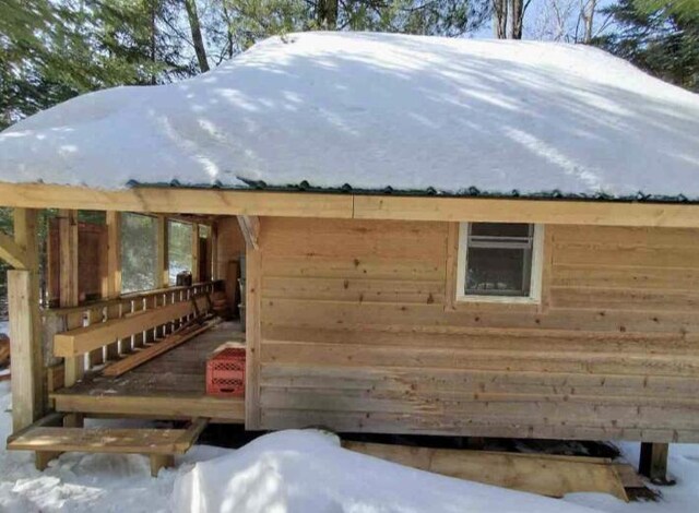 4550 E Simmons Rd, Hessel, MI 49745 - view of snowy exterior