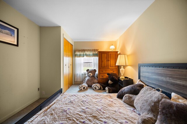7654 M 32 E, Johannesburg, MI 49751 - carpeted bedroom featuring baseboards and a closet