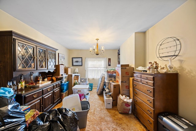 7654 M 32 E, Johannesburg, MI 49751 - dining area featuring a chandelier and light colored carpet