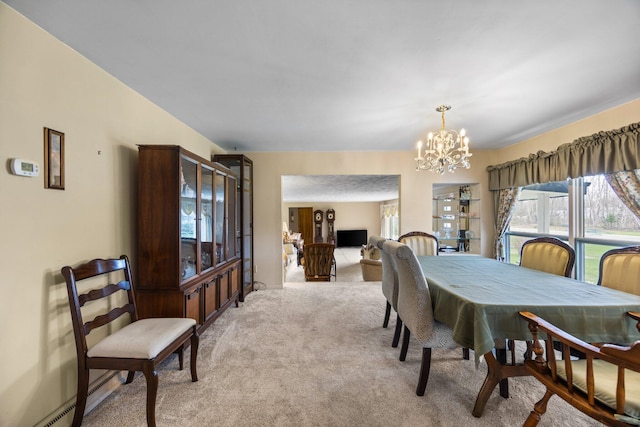 7654 M 32 E, Johannesburg, MI 49751 - carpeted dining room featuring a chandelier