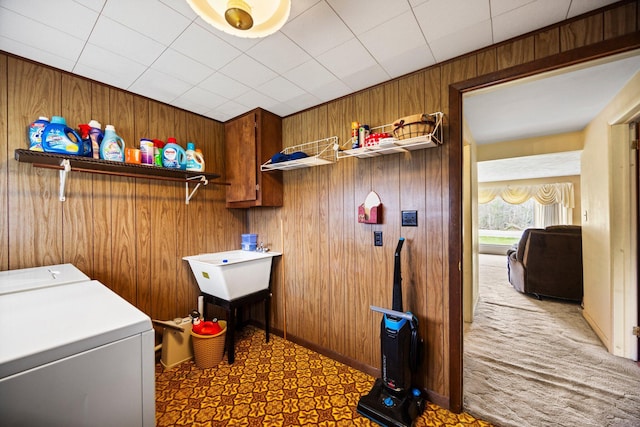 7654 M 32 E, Johannesburg, MI 49751 - washroom featuring wooden walls and washer and clothes dryer