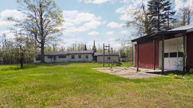 7654 M 32 E, Johannesburg, MI 49751 - view of grassy yard featuring an outdoor structure