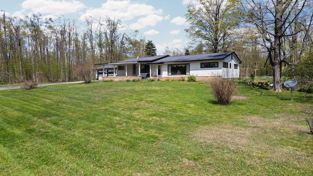 7654 M 32 E, Johannesburg, MI 49751 - ranch-style house with a front lawn and covered porch