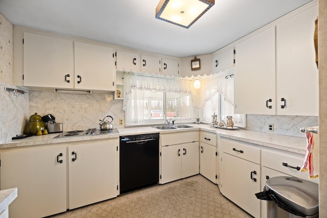 7654 M 32 E, Johannesburg, MI 49751 - kitchen with dishwasher, a sink, decorative backsplash, and light countertops