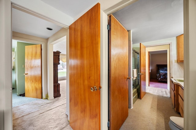 7654 M 32 E, Johannesburg, MI 49751 - corridor featuring light colored carpet