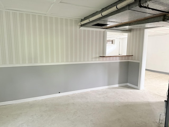 7654 M 32 E, Johannesburg, MI 49751 - basement featuring wallpapered walls and baseboards