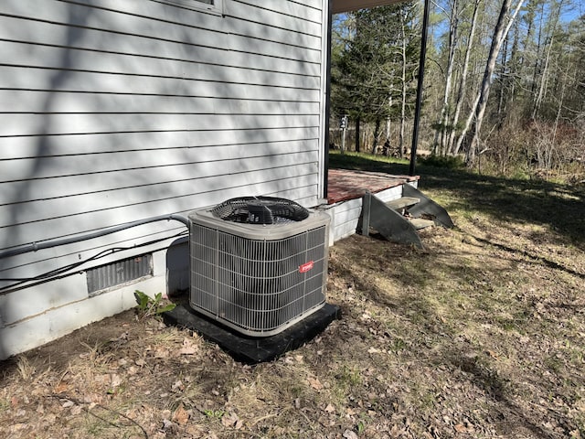 1321 Eagle Point Rd, Grayling, MI 49738 - exterior view of central air condition unit and crawl space