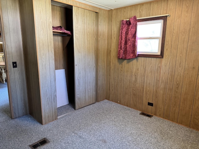 1321 Eagle Point Rd, Grayling, MI 49738 - unfurnished bedroom with carpet and wooden walls