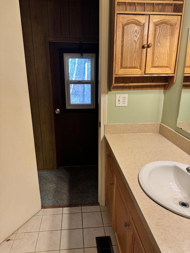 1321 Eagle Point Rd, Grayling, MI 49738 - bathroom featuring tile patterned flooring and vanity