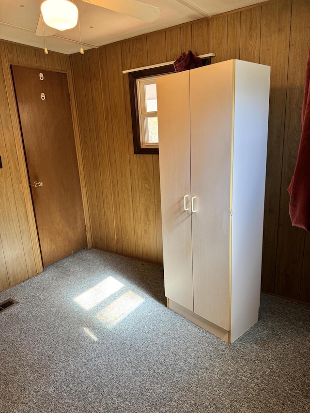 1321 Eagle Point Rd, Grayling, MI 49738 - unfurnished bedroom with carpet and wooden walls