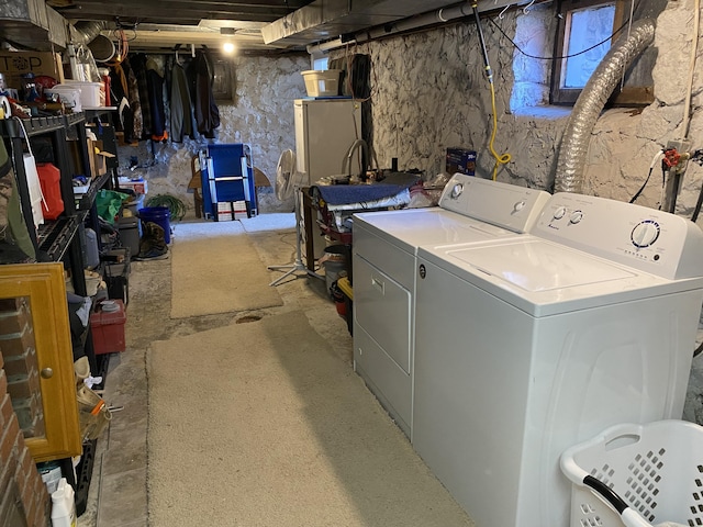 737 S First St, Rogers City, MI 49779 - laundry room featuring washing machine and dryer