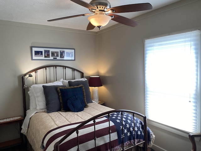 737 S First St, Rogers City, MI 49779 - bedroom featuring a ceiling fan