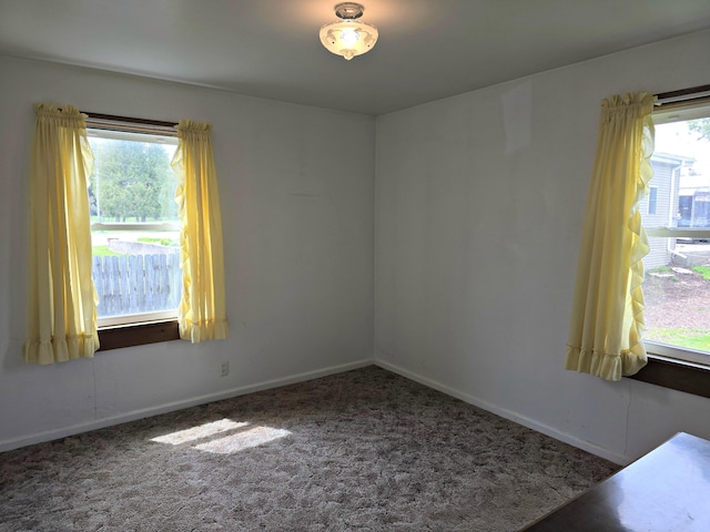 26 Michigan St, Saint Ignace, MI 49781 - carpeted spare room with baseboards