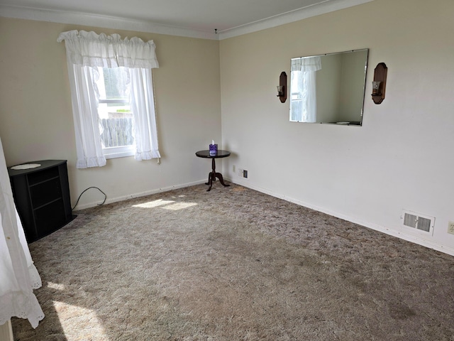 26 Michigan St, Saint Ignace, MI 49781 - unfurnished room with ornamental molding, carpet, and baseboards