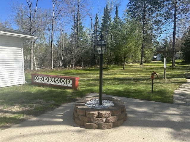 1371 Wayne Rd, Alpena, MI 49707 - view of home's community featuring a yard