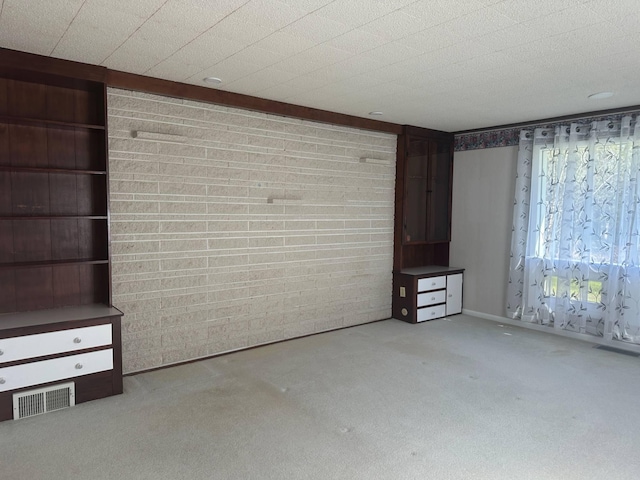 1371 Wayne Rd, Alpena, MI 49707 - unfurnished living room featuring carpet floors