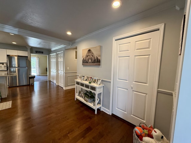 1073 S Hoot Owl Ln, Grayling, MI 49738 - hall featuring ornamental molding, dark wood-type flooring, recessed lighting, and baseboards