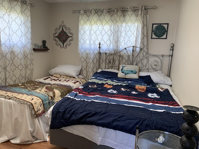 bedroom featuring wood finished floors