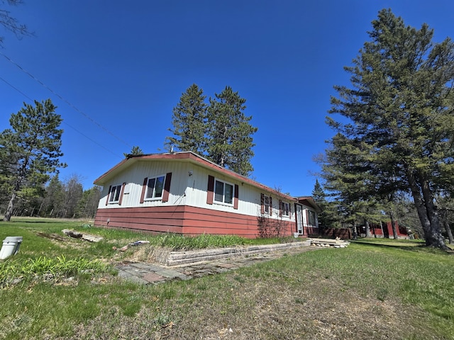 3625 Mckinley Rd, Mio, MI 48647 - view of side of home with a yard