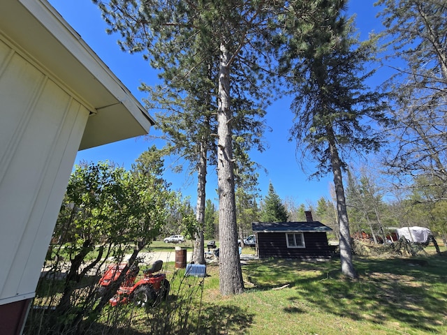 3625 Mckinley Rd, Mio, MI 48647 - view of grassy yard with an outdoor structure