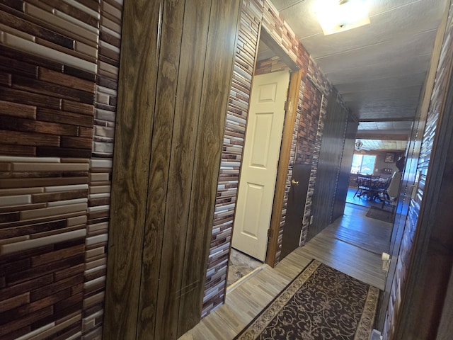 3625 Mckinley Rd, Mio, MI 48647 - hall featuring wooden walls and light wood-style floors