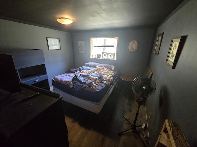 3625 Mckinley Rd, Mio, MI 48647 - bedroom with dark wood-type flooring