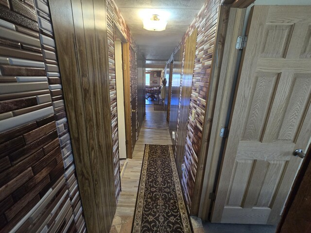 3625 Mckinley Rd, Mio, MI 48647 - hall with wood finished floors and wooden walls