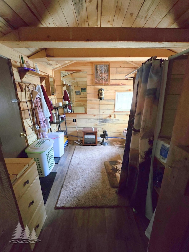 4097 Sunset Dr, Lewiston, MI 49756 - bathroom featuring wood finished floors, wood ceiling with exposed beams, wooden walls, and curtained shower