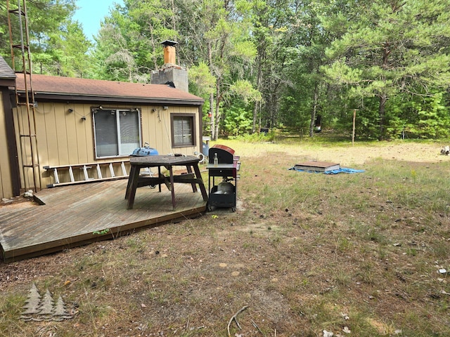 4097 Sunset Dr, Lewiston, MI 49756 - view of yard featuring a wooden deck
