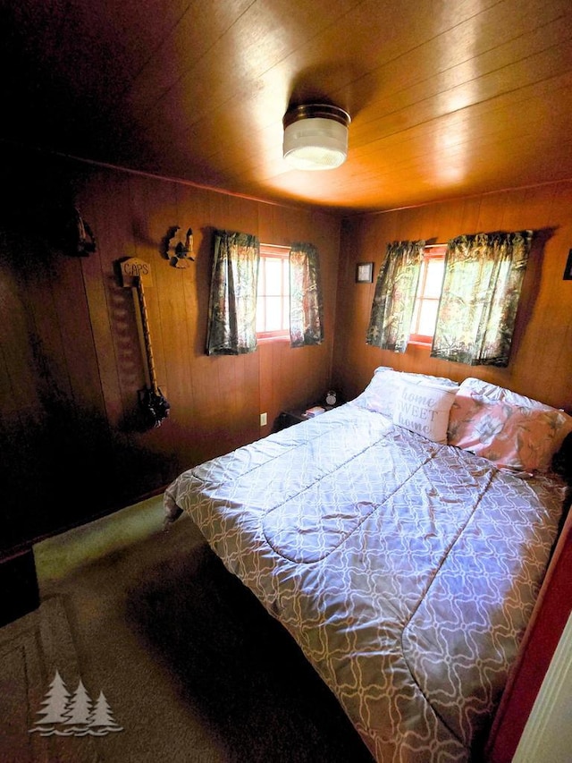 4097 Sunset Dr, Lewiston, MI 49756 - bedroom featuring wooden walls and wooden ceiling