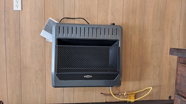 10340 US-23, Cheboygan, MI 49721 - detailed view of heating unit and wooden walls