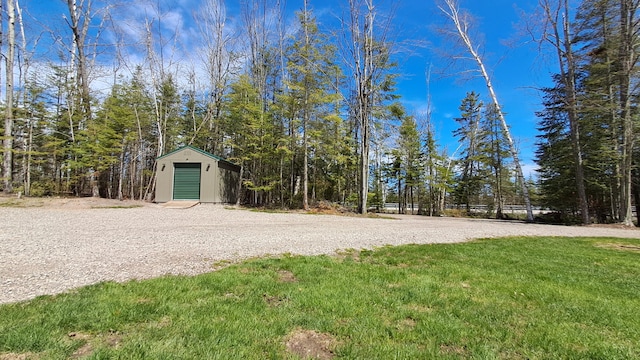 10340 US-23, Cheboygan, MI 49721 - view of yard with a storage shed and an outdoor structure