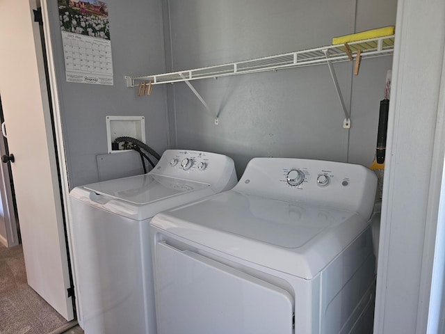 10340 US-23, Cheboygan, MI 49721 - clothes washing area with separate washer and dryer and carpet