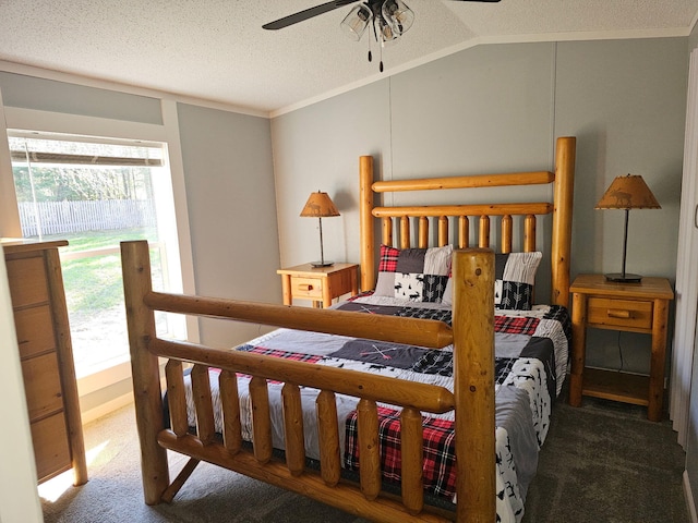 10340 US-23, Cheboygan, MI 49721 - bedroom with carpet floors, crown molding, a textured ceiling, vaulted ceiling, and a ceiling fan