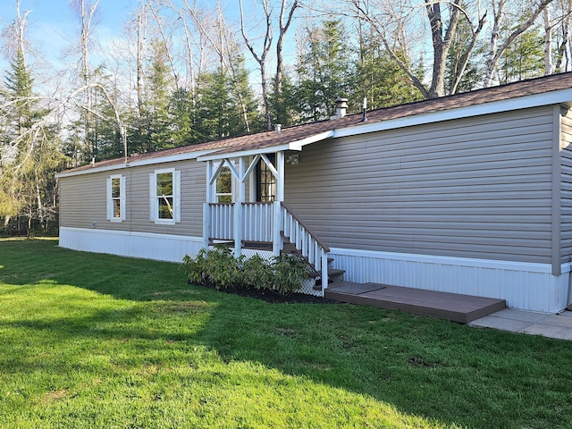 10340 US-23, Cheboygan, MI 49721 - view of front of property with a front lawn
