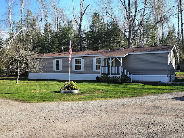 10340 US-23, Cheboygan, MI 49721 - manufactured / mobile home with a front lawn