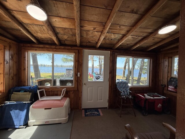 6299 Woodland Dr, Oscoda, MI 48750 - sunroom / solarium featuring a water view