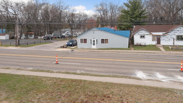 3182 W Houghton Lake Dr, Houghton Lake, MI 48629 - view of asphalt street featuring sidewalks and curbs
