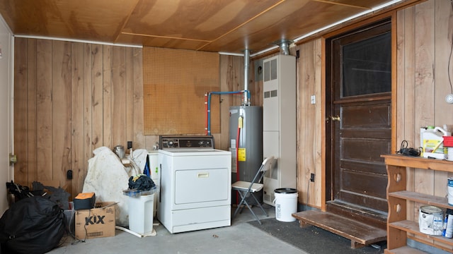 3182 W Houghton Lake Dr, Houghton Lake, MI 48629 - below grade area featuring washer / clothes dryer, water heater, and wood walls