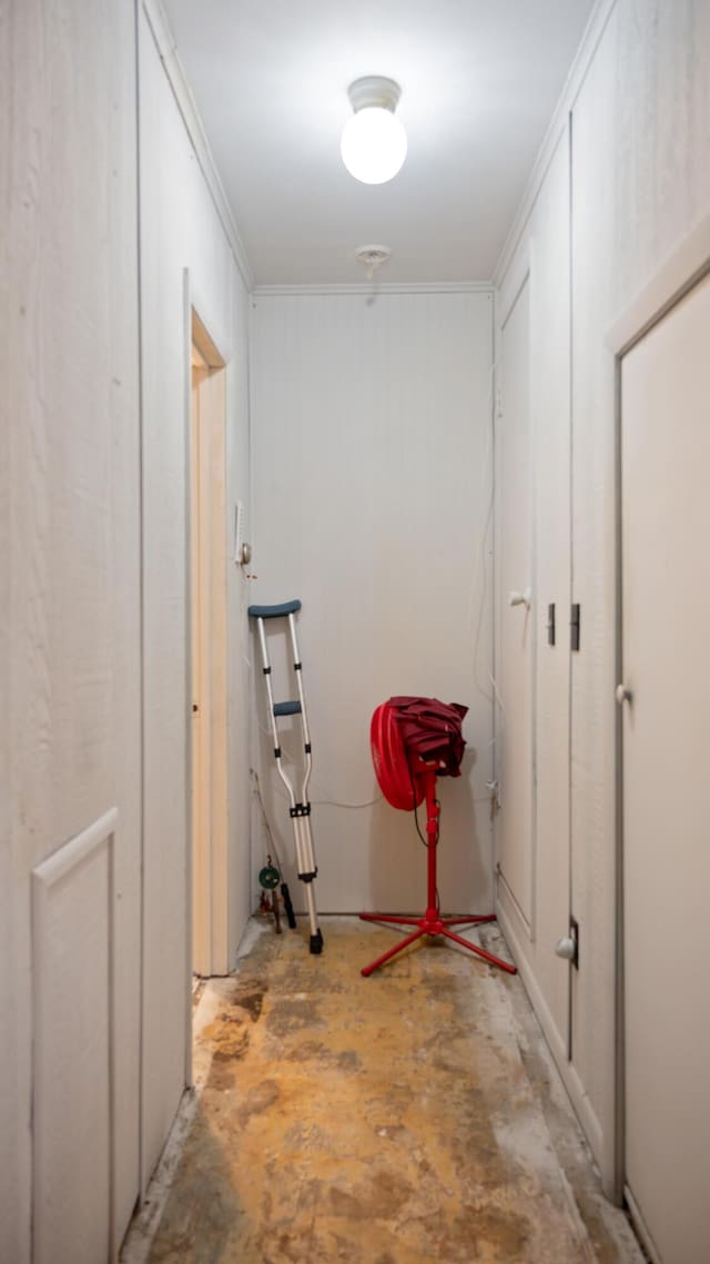 3182 W Houghton Lake Dr, Houghton Lake, MI 48629 - hallway with unfinished concrete floors and ornamental molding