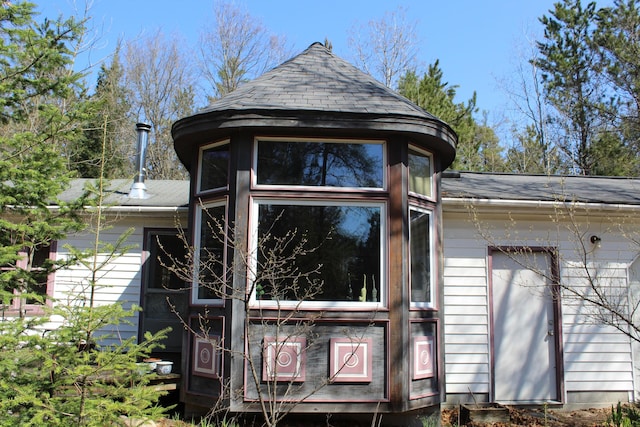 2032 W Oak Rd, Luzerne, MI 48636 - view of home's exterior with roof with shingles